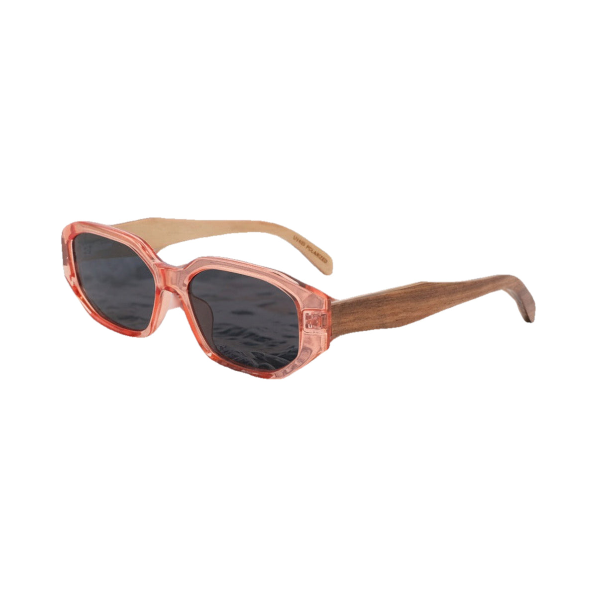 Bamboo Belle Coral bamboo sunglasses on white background